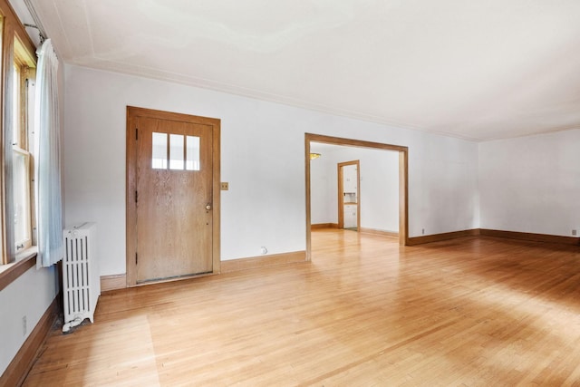 4300 Beard Ave S, Minneapolis, MN 55410 - unfurnished room with radiator and light wood-style floors