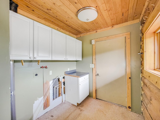 1283 Island Lake Dr NW, Powers Twp, MN 56435 - laundry room with cabinet space, wooden ceiling, light carpet, hookup for a washing machine, and hookup for an electric dryer