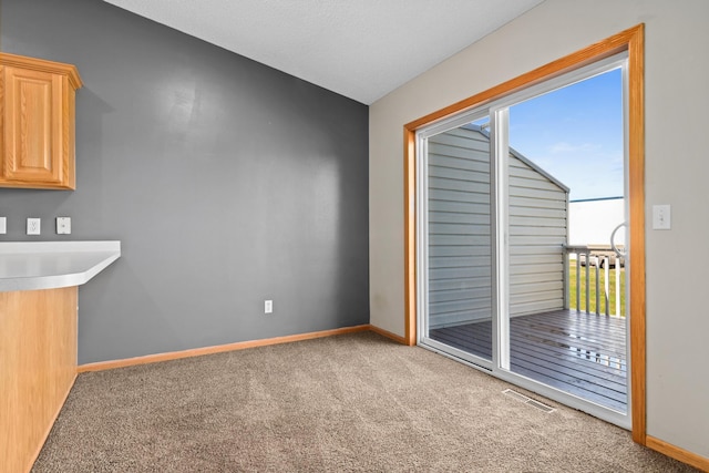 7289 32nd Ave N, Crystal, MN 55427 - unfurnished dining area with carpet and baseboards