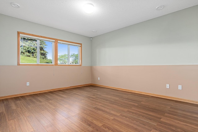 7289 32nd Ave N, Crystal, MN 55427 - empty room with wood finished floors and baseboards