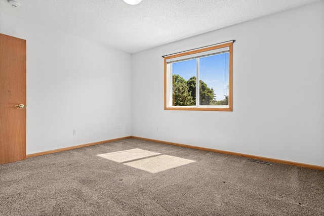 7289 32nd Ave N, Crystal, MN 55427 - carpeted empty room featuring a textured ceiling and a smoke detector