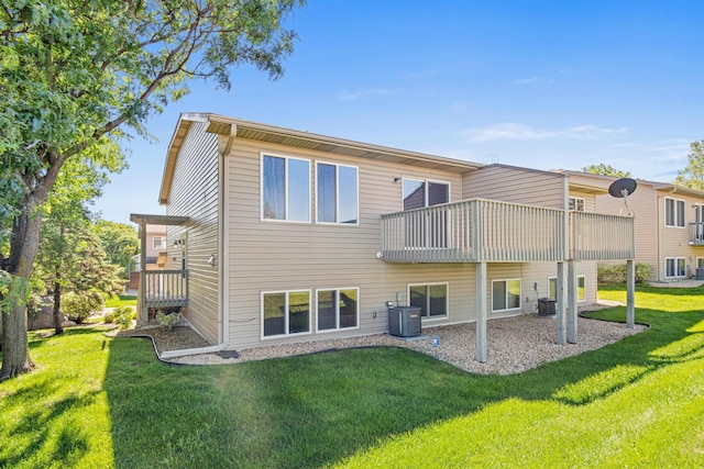 7289 32nd Ave N, Crystal, MN 55427 - rear view of house featuring a yard and a balcony