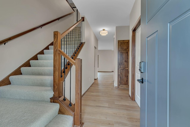 1504 20th Ave S, Sartell, MN 56377 - foyer entrance featuring stairway and light wood-type flooring
