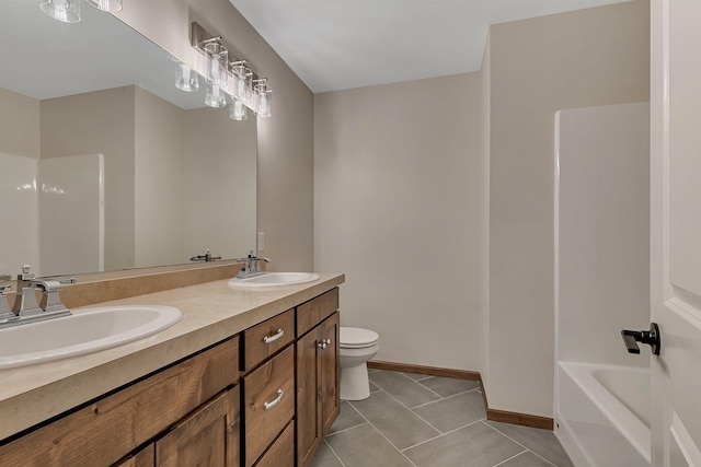 1504 20th Ave S, Sartell, MN 56377 - full bath with double vanity, tile patterned floors, and shower / bathtub combination