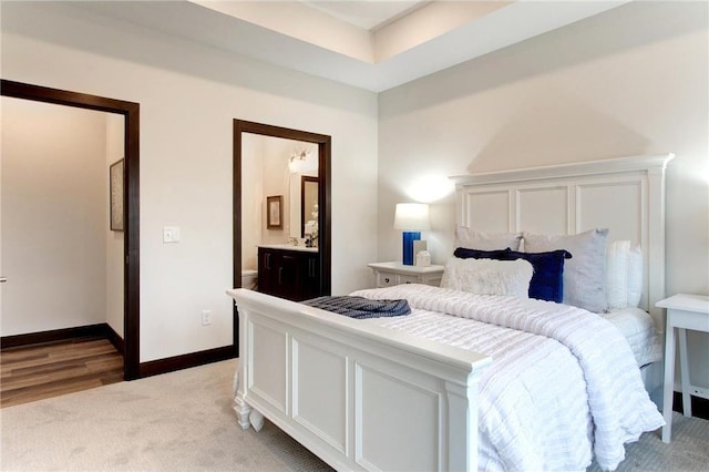 117 Maple Ct, Cannon Falls, MN 55009 - bedroom featuring light carpet and connected bathroom