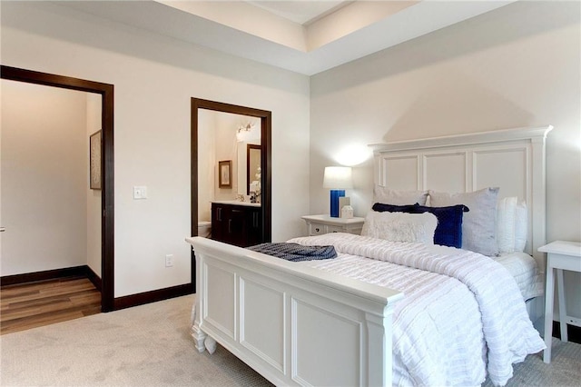 117 Maple Ct, Cannon Falls, MN 55009 - bedroom featuring light carpet and ensuite bath