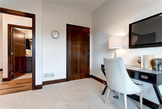 117 Maple Ct, Cannon Falls, MN 55009 - home office with baseboards and light carpet