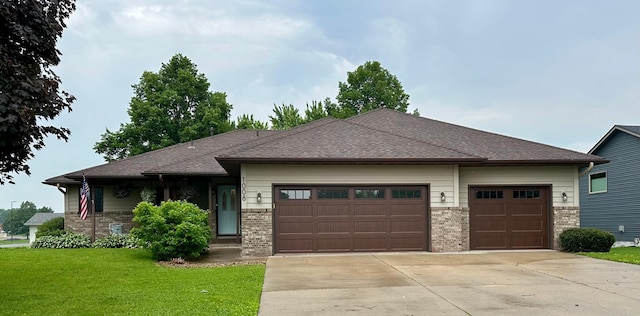 1008 3rd St NE, New Prague, MN 56071 - view of front of home with an attached garage, concrete driveway, a front yard, and brick siding