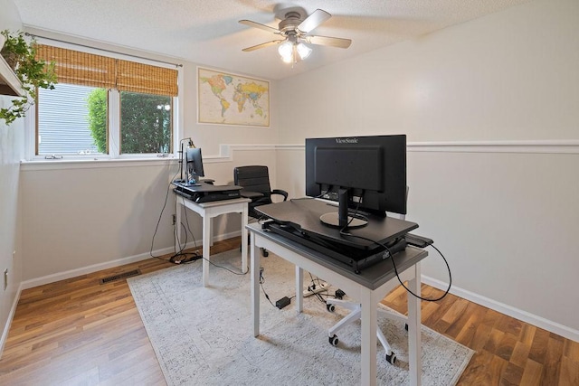1008 3rd St NE, New Prague, MN 56071 - office area featuring ceiling fan and wood finished floors