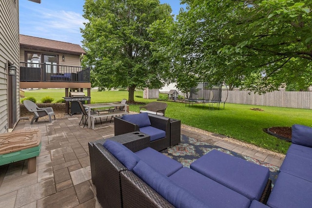 1008 3rd St NE, New Prague, MN 56071 - view of patio with an outdoor living space, a trampoline, outdoor dining space, and grilling area