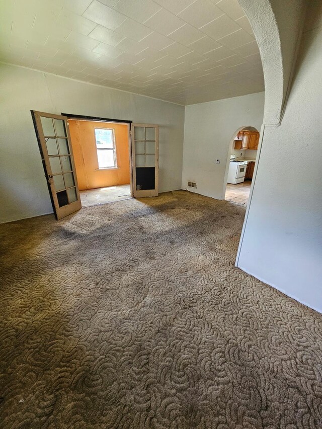 730 Front St, Albert Lea, MN 56007 - carpeted spare room featuring arched walkways
