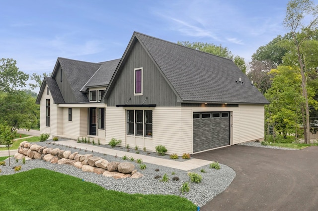 2706 Lakeview Ct, Little Canada, MN 55117 - modern farmhouse with driveway, a shingled roof, and a garage