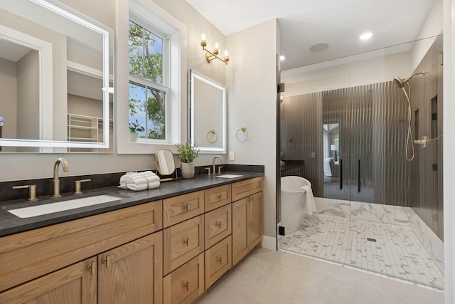 2706 Lakeview Ct, Little Canada, MN 55117 - bathroom featuring a stall shower, double vanity, a soaking tub, tile patterned floors, and recessed lighting