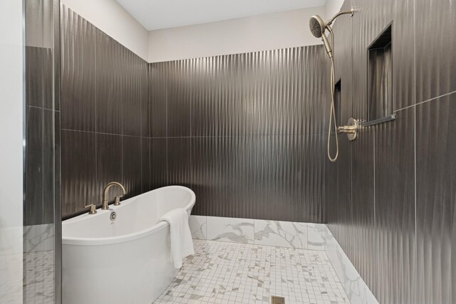 2706 Lakeview Ct, Little Canada, MN 55117 - bathroom with a freestanding bath, tiled shower, and tile patterned floors