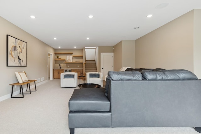 2706 Lakeview Ct, Little Canada, MN 55117 - living area featuring light colored carpet, stairs, and recessed lighting