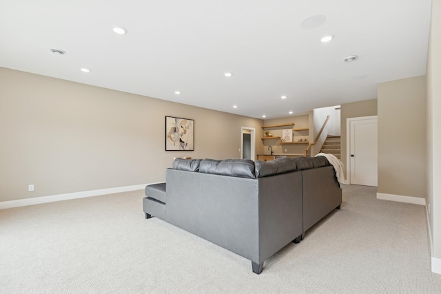 2706 Lakeview Ct, Little Canada, MN 55117 - living area featuring light colored carpet, stairs, and recessed lighting