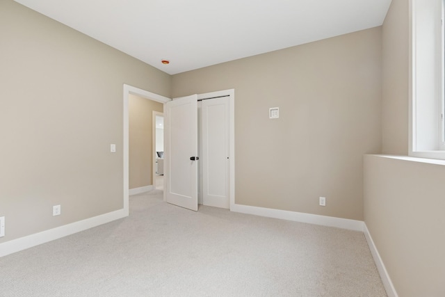 2706 Lakeview Ct, Little Canada, MN 55117 - unfurnished room featuring light colored carpet and baseboards