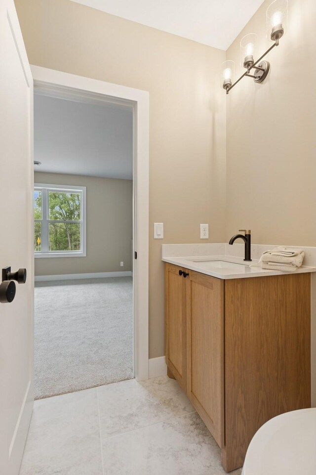 2706 Lakeview Ct, Little Canada, MN 55117 - bathroom with vanity and tile patterned flooring