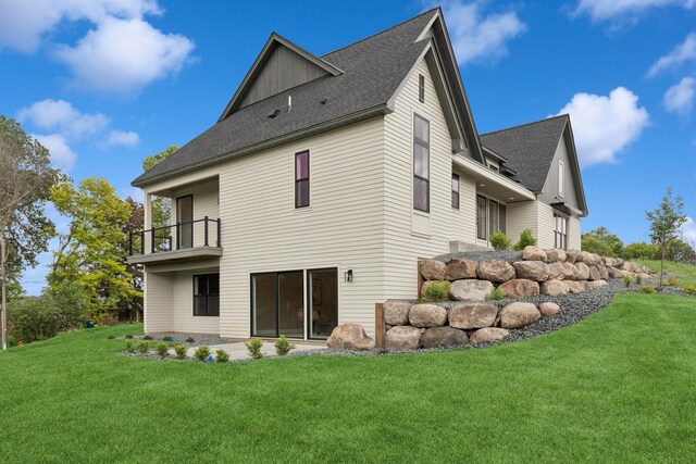 2706 Lakeview Ct, Little Canada, MN 55117 - back of house with a balcony, a yard, and roof with shingles