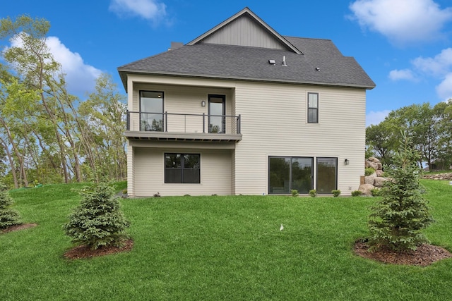 2706 Lakeview Ct, Little Canada, MN 55117 - back of house with a balcony, a yard, and a shingled roof