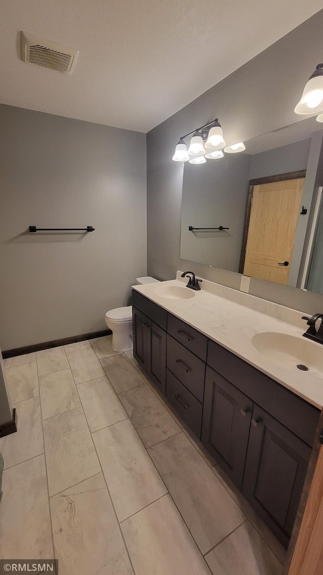 1912 Nelson Lake Rd, Pillager, MN 56473 - full bathroom with double vanity and toilet