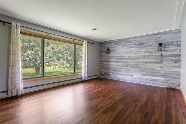 39743 County Road 1, Brockway Twp, MN 56367 - unfurnished room featuring wood finished floors, an accent wall, wooden walls, and baseboard heating