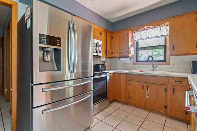 39743 County Road 1, Brockway Twp, MN 56367 - kitchen featuring appliances with stainless steel finishes, plenty of natural light, light countertops, and tasteful backsplash