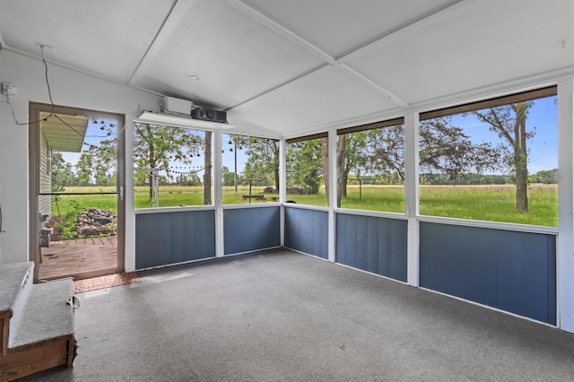 39743 County Road 1, Brockway Twp, MN 56367 - unfurnished sunroom featuring vaulted ceiling and healthy amount of natural light