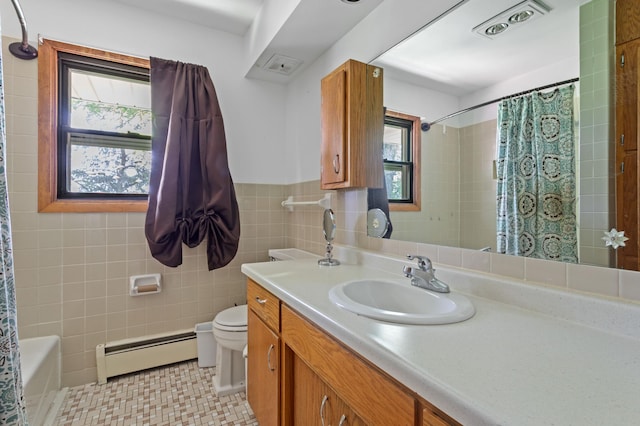 39743 County Road 1, Brockway Twp, MN 56367 - full bath with a baseboard heating unit, vanity, tile walls, wainscoting, and shower / bathtub combination with curtain