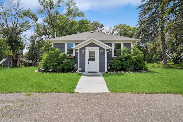 3178 253rd Ave NW, Isanti, MN 55040 - view of front of house with a front lawn and roof with shingles