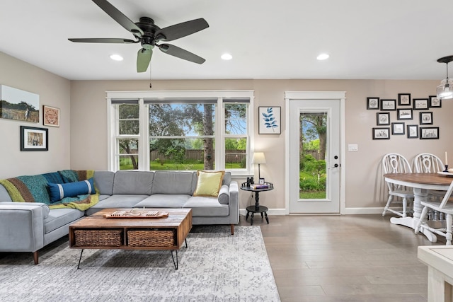 3178 253rd Ave NW, Isanti, MN 55040 - living room with recessed lighting, a ceiling fan, and wood finished floors