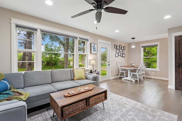 3178 253rd Ave NW, Isanti, MN 55040 - living room with recessed lighting, a ceiling fan, and wood finished floors