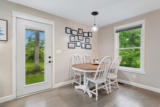 3178 253rd Ave NW, Isanti, MN 55040 - dining room with plenty of natural light and wood finished floors