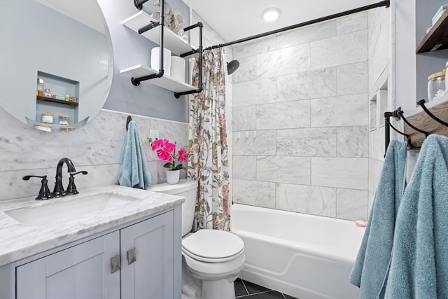 3178 253rd Ave NW, Isanti, MN 55040 - full bathroom featuring vanity, shower / bath combo, tile walls, and tile patterned flooring