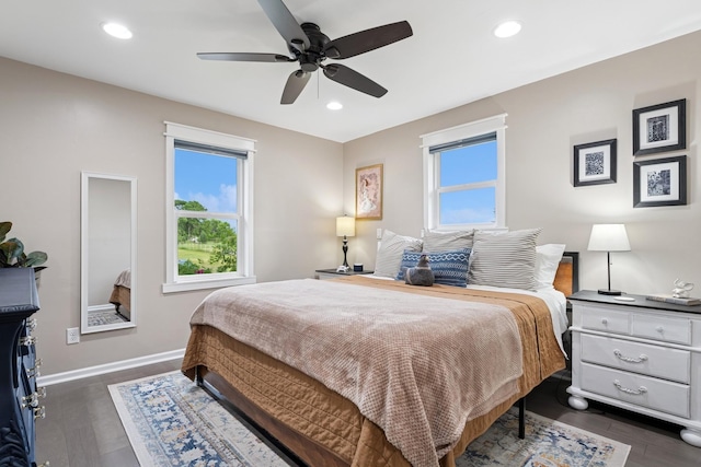 3178 253rd Ave NW, Isanti, MN 55040 - bedroom with multiple windows, dark wood-type flooring, recessed lighting, and a ceiling fan