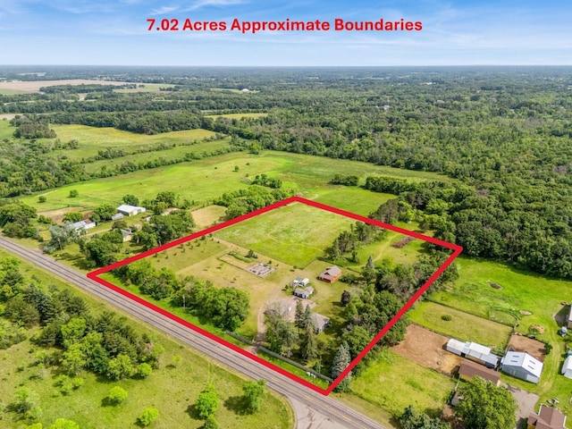 3178 253rd Ave NW, Isanti, MN 55040 - aerial view of property's location featuring property parcel outlined and a heavily wooded area