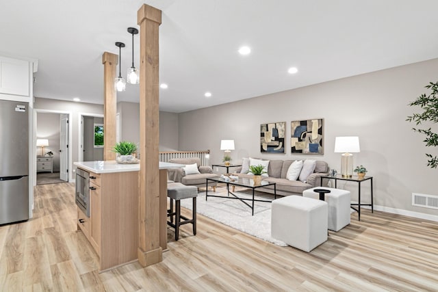 6980 Crest Dr, Maple Grove, MN 55311 - living area featuring light wood-type flooring and recessed lighting