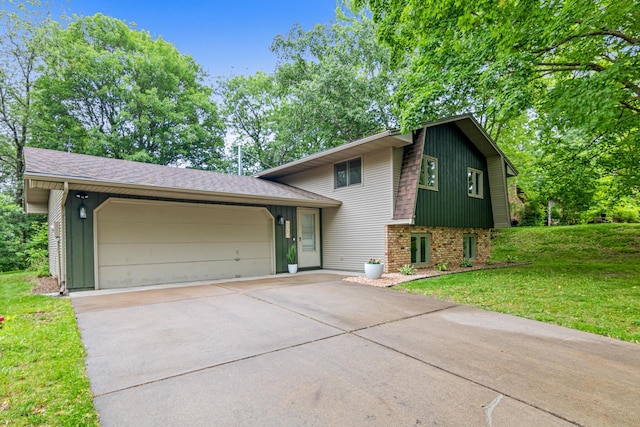 6980 Crest Dr, Maple Grove, MN 55311 - split level home featuring a garage, driveway, a front lawn, and brick siding