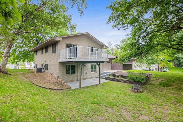 6980 Crest Dr, Maple Grove, MN 55311 - rear view of property with a fire pit, a patio, a lawn, and a wooden deck