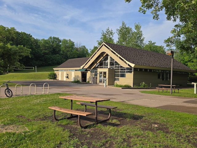 6980 Crest Dr, Maple Grove, MN 55311 - view of property's community featuring a yard and volleyball court