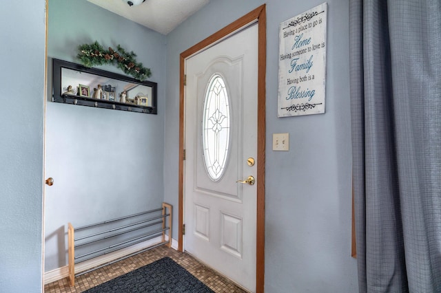 707 Marshall Ave, Henning, MN 56551 - foyer featuring baseboards