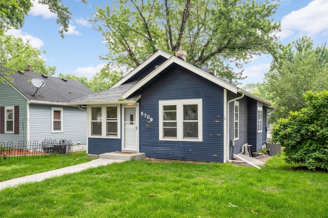 5709 26th Ave S, Minneapolis, MN 55417 - bungalow-style home featuring a chimney