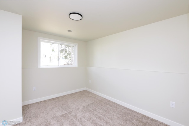 1109 University Dr S, Fargo, ND 58103 - carpeted empty room with baseboards