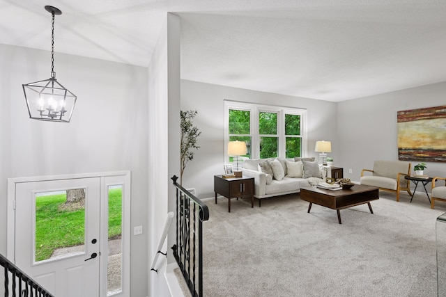 711 9th St NW, Buffalo, MN 55313 - living room featuring a chandelier and carpet floors