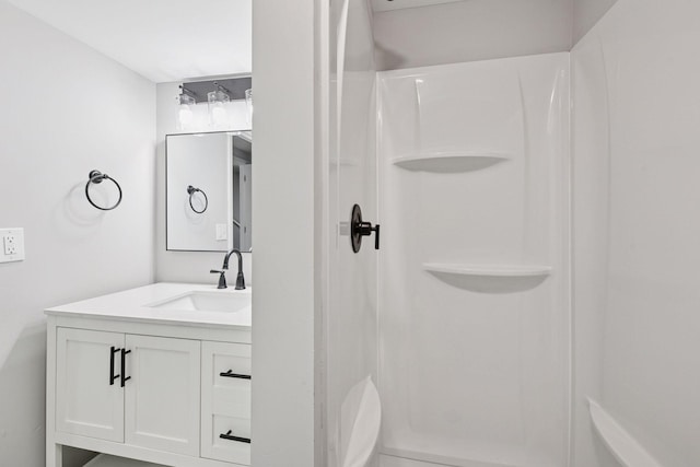 711 9th St NW, Buffalo, MN 55313 - bathroom with vanity and a shower