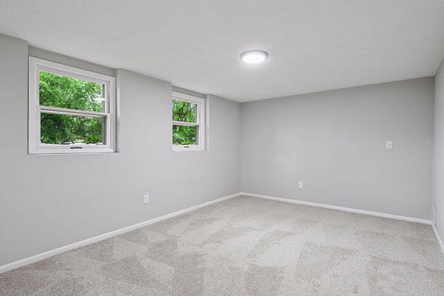 711 9th St NW, Buffalo, MN 55313 - carpeted spare room featuring baseboards