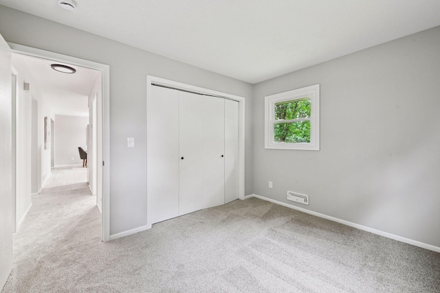 711 9th St NW, Buffalo, MN 55313 - unfurnished bedroom with carpet floors and a closet