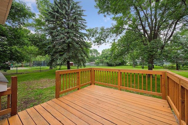 711 9th St NW, Buffalo, MN 55313 - wooden terrace with a lawn
