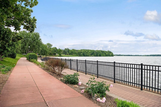 711 9th St NW, Buffalo, MN 55313 - view of patio / terrace with a water view