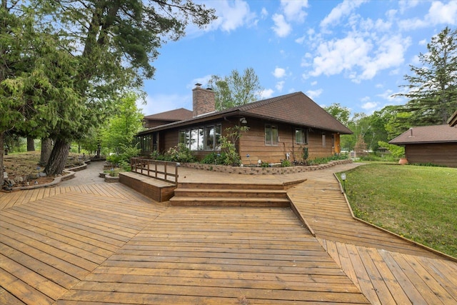 2236 Birch Point Rd Unit A, Tower, MN 55790 - wooden deck with a yard